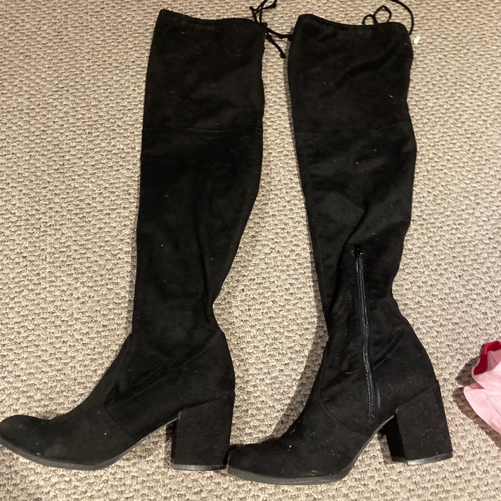 Knee high black heel boots